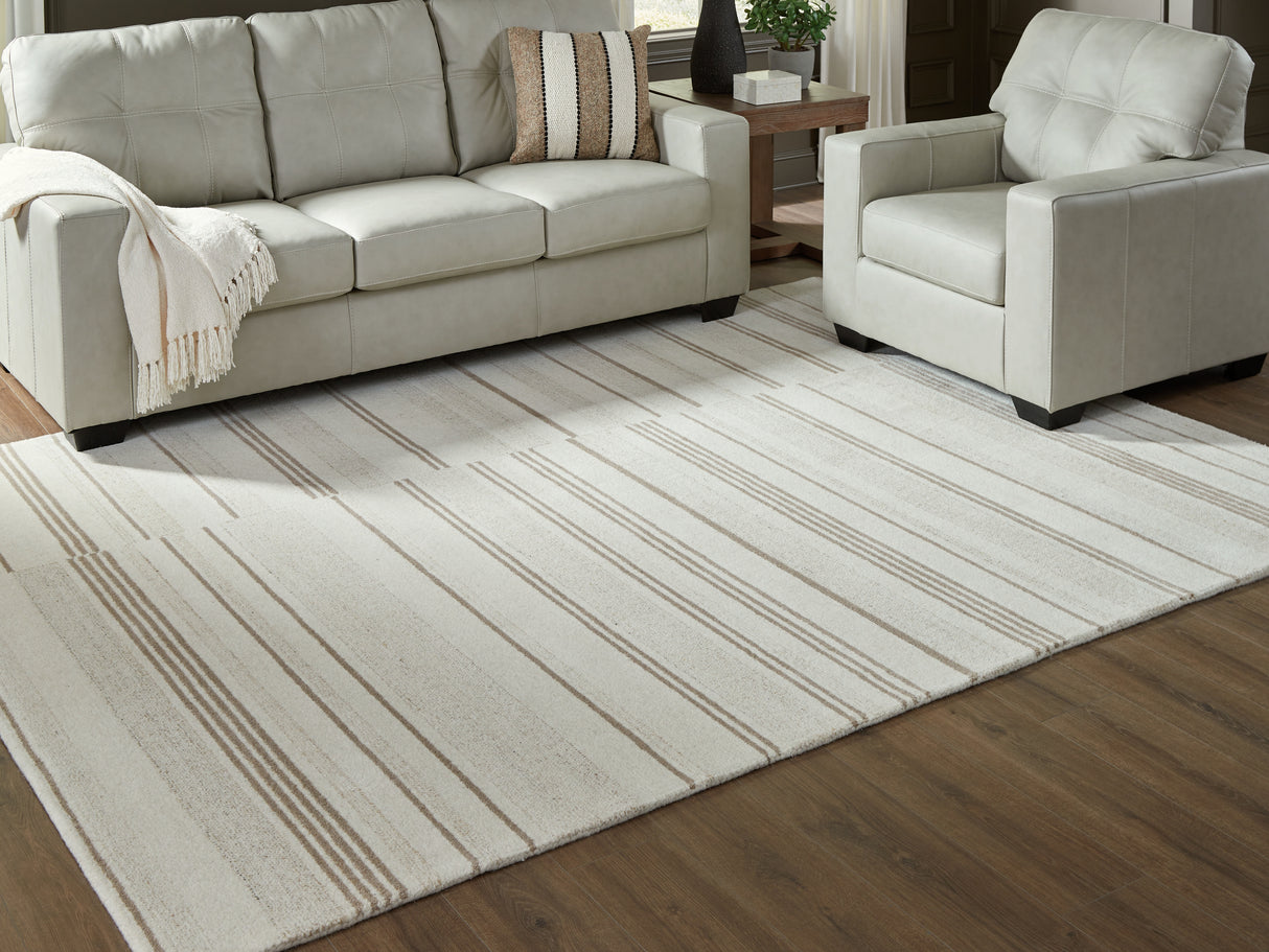Furniture City Houma - Ashley Furniture - Gadence Rug - 7'8" x 10' Area Rug / Ivory/Tan - R407641