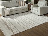 Furniture City Houma - Ashley Furniture - Gadence Rug - 7'8" x 10' Area Rug / Ivory/Tan - R407641