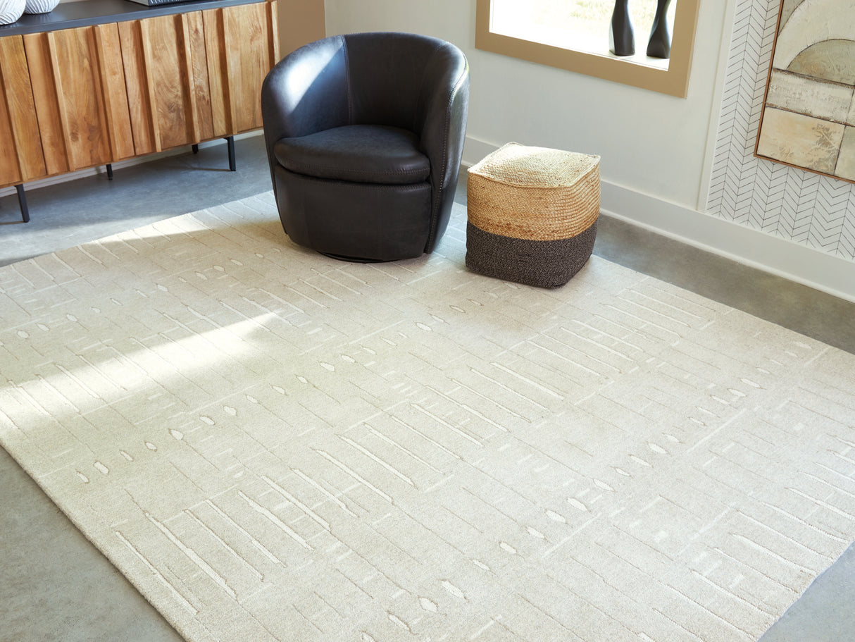 Furniture City Houma - Ashley Furniture - Wolbert Rug - 7'8" x 10' Area Rug / Tan/Ivory - R407661