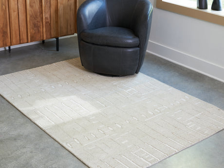 Furniture City Houma - Ashley Furniture - Wolbert Rug - 5' x 7' Area Rug / Tan/Ivory - R407662