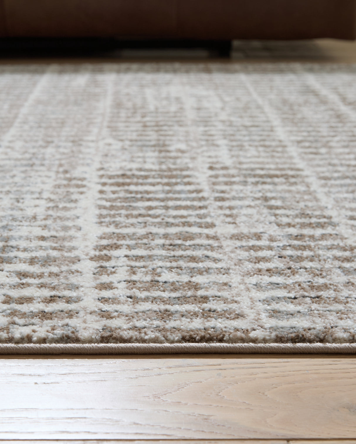 Fuadwick 5'3" x 7' Area Rug