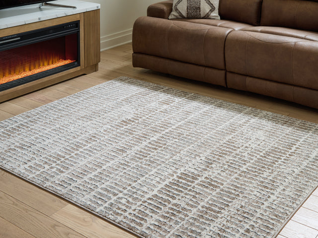 Furniture City Houma - Ashley Furniture - Fuadwick 5'3" x 7' Area Rug - 5'3" x 7' Area Rug / Multi - R407692