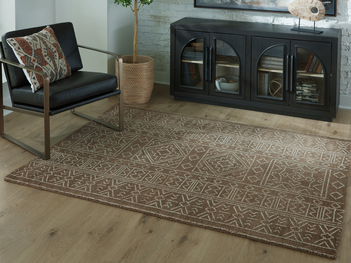Furniture City Houma - Ashley Furniture - Merrittman Rug - 5' x 7' Area Rug / Brown/Ivory - R407702