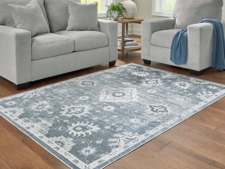Furniture City Houma - Ashley Furniture - Avanworths Rug - Washable 7'10" x 10' Area Rug / Blue/Gray/Ivory - R407791