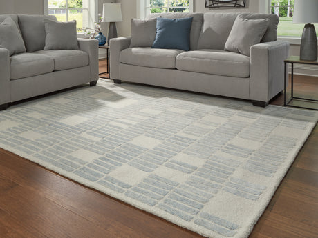 Furniture City Houma - Ashley Furniture - Dylanton Rug - 7'8" x 10' Area Rug / Ivory/Blue - R407811