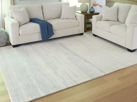 Furniture City Houma - Ashley Furniture - Genemost 7'8" x 10' Area Rug - 7'8" x 10' Area Rug / Ivory/Blue - R407841