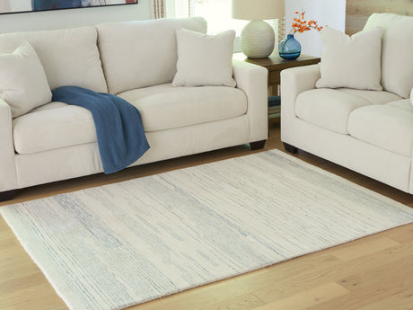 Furniture City Houma - Ashley Furniture - Genemost Rug - 5' x 7' Area Rug / Ivory/Blue - R407842