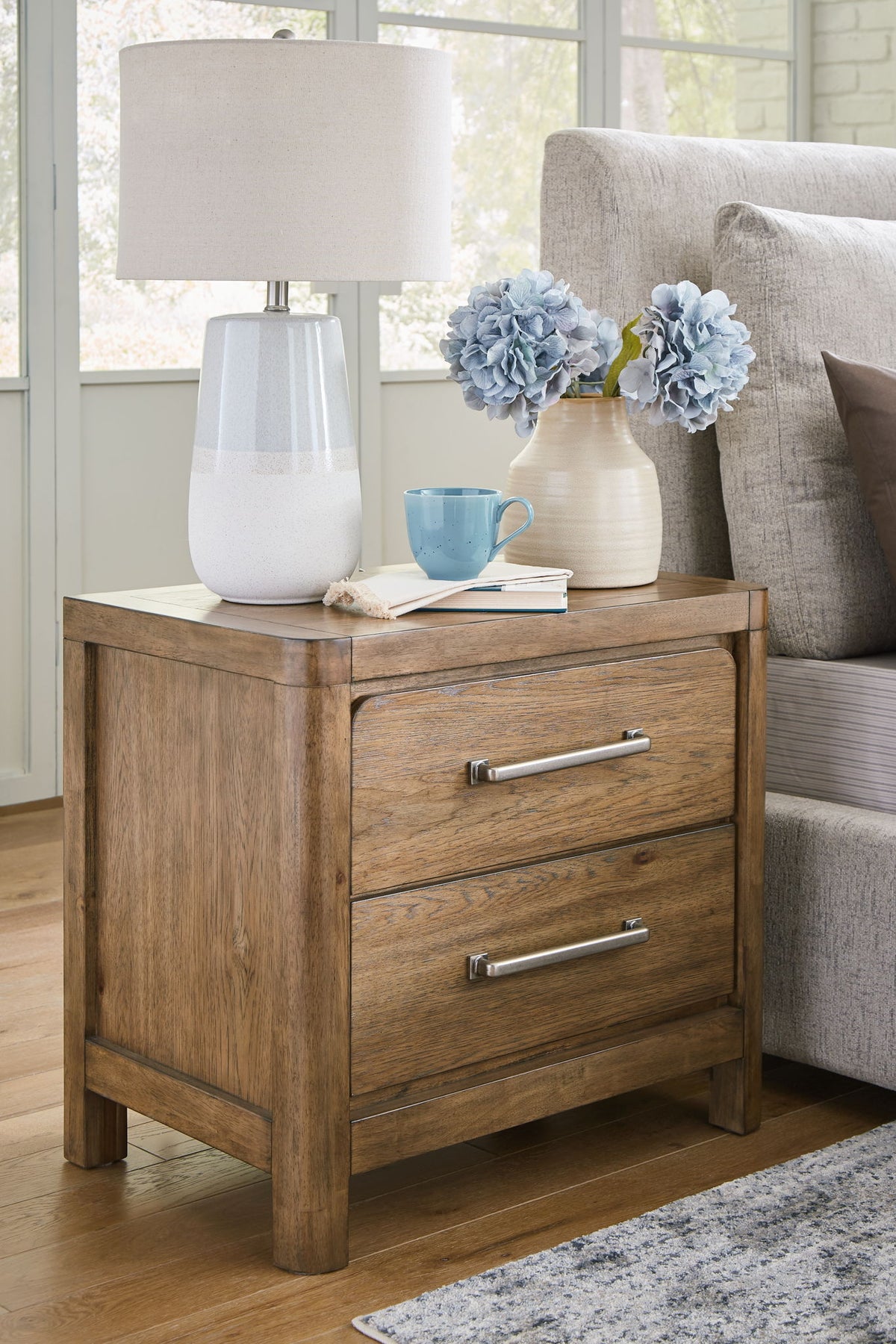 Cabalynn - Two Drawer Night Stand - Light Brown