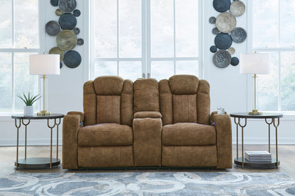 Wolfridge - Power Reclining Loveseat With Console /Adj Hdrst - Brindle